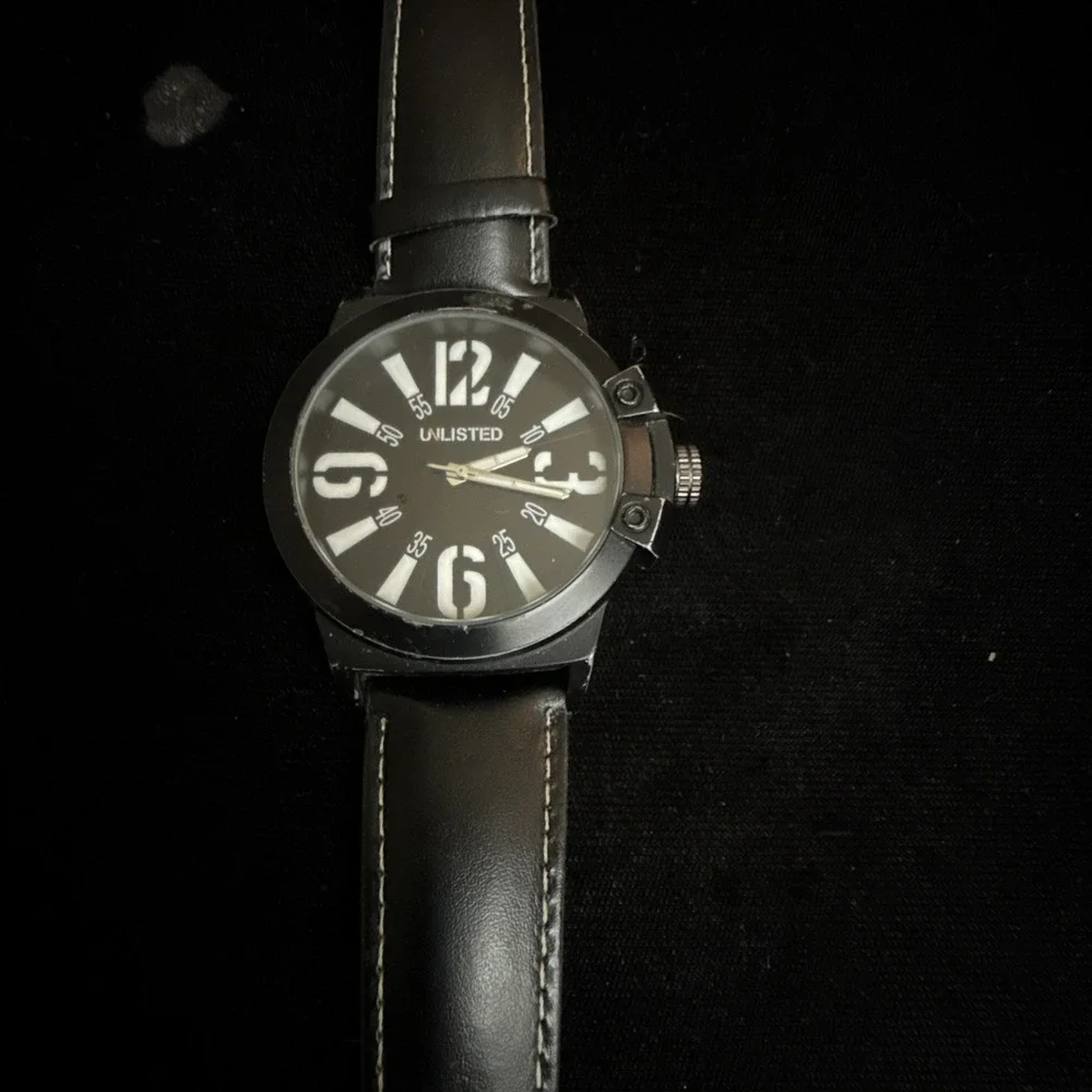 Unlisted 1009285 Black Tone Quartz Analog Men's Watch Needs Battery. ‎ 4199